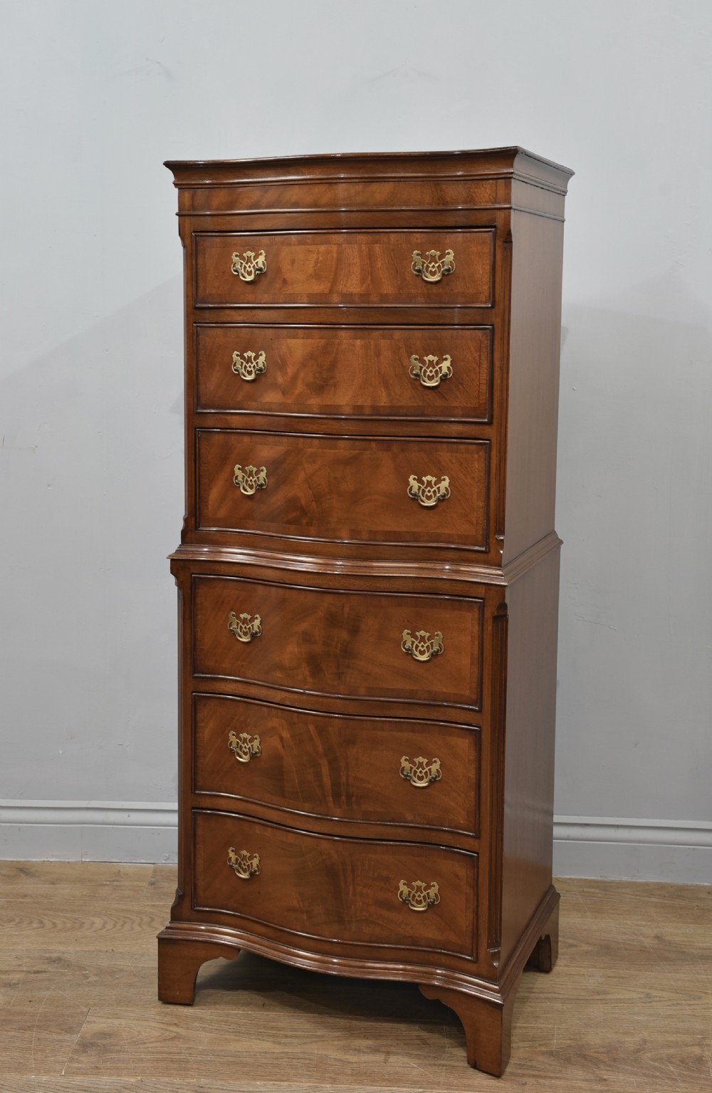 Antique Regency style mahogany serpentine tall boy chest on chest 