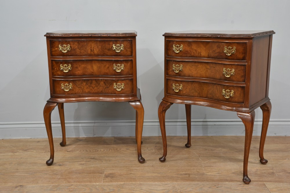 pair of Queen Anne style walnut bedside chests of drawers 