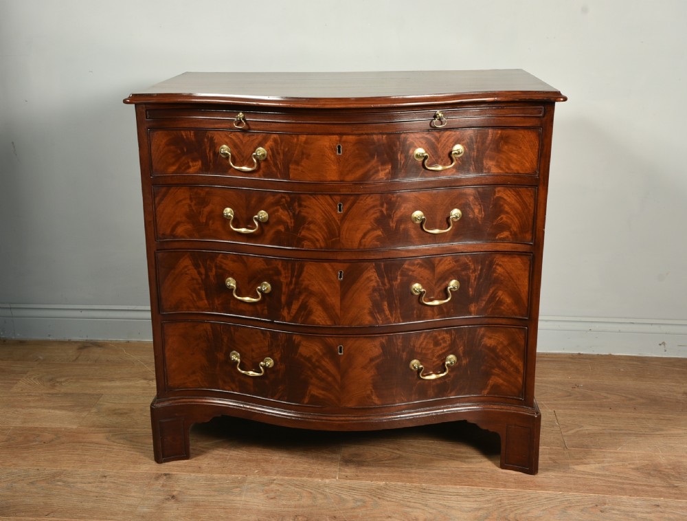 Antique Regency mahogany serpentine chest of drawers 