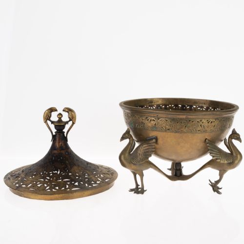 fig 3. An antique Indian bronze incense burner with a pierced domed lid, twin bird top finials, and three bird-shaped tripod legs.