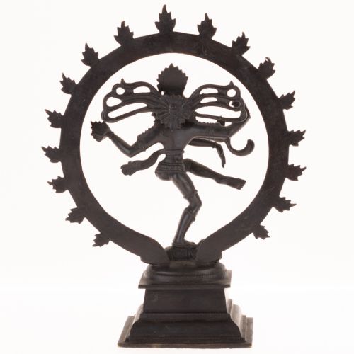 fig 2. A dark patinated bronze sculpture depicting the Hindu deity Shiva Nataraja as the cosmic dancer encircled by a flaming halo atop a tiered square pedestal.