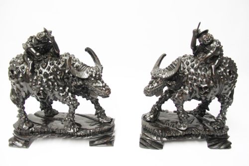 A Pair of Chinese Hardwood Buffalo