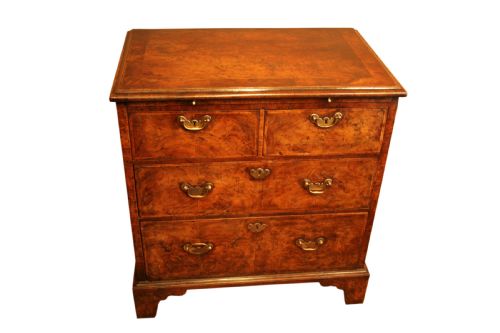 A Rare Small George I Figured Walnut Chest of Drawers