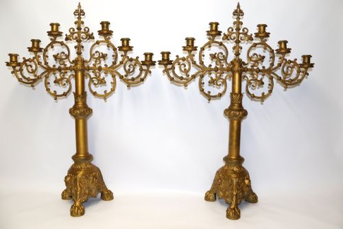A Large Pair of Gothic  Gilt Brass Candelabra