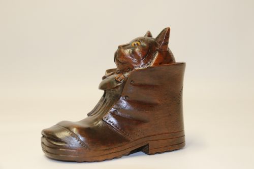 a black forest carved walnut kitten sitting in a boot - CATEGORY: ANTIQUE MISCELLANEOUS - DATED 1910