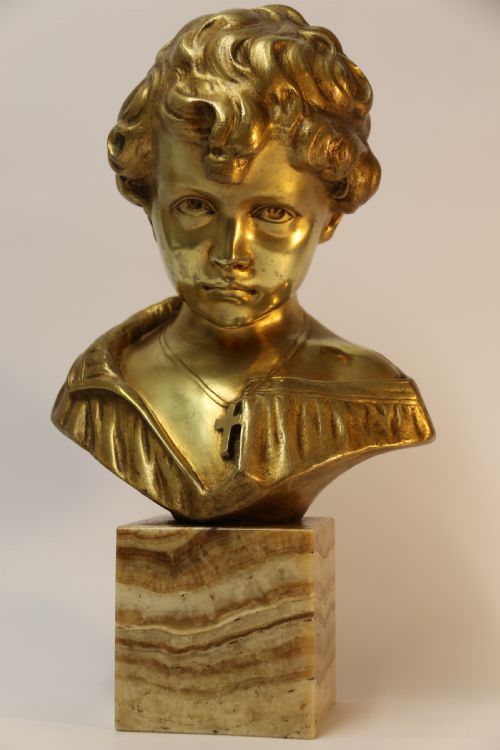 A Gilt Bronze Bust of a Boy After Donatello