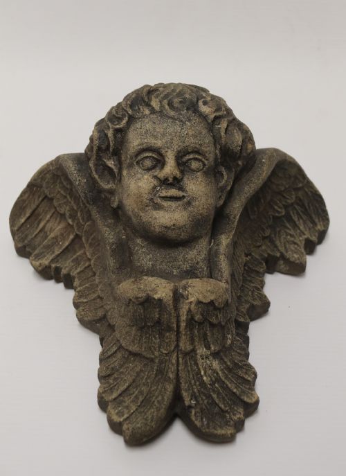 A Hand Carved Portland Stone Wall Cherub, Signed M. R Bland,1874