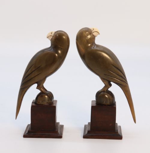 An Indian Raj Period Pair of Carved Buffalo Horn Parrots on Wooden Stands, Circa 1890

