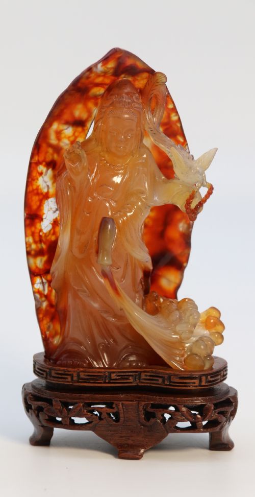 A Very Fine and Rare Chinese Hand Carved Agate Hardstone Figure of the Goddess Guanyin.