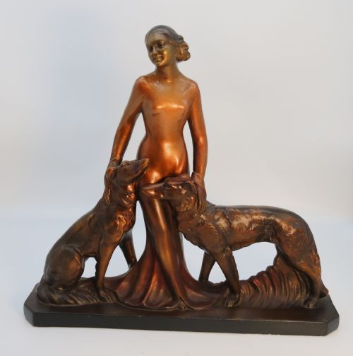 An Elegant Art Deco Plaster and Cold Painted Figure Group, Circa 1930