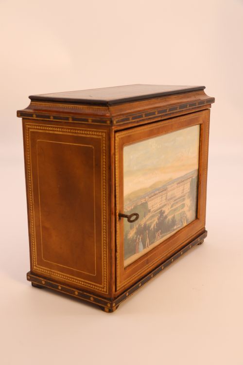 fig 1. An Italian Grand Tour late 19th century jewellery cabinet finished in gilt tooled leather with a hand coloured view of The Royal Palace, Caserta Italy.