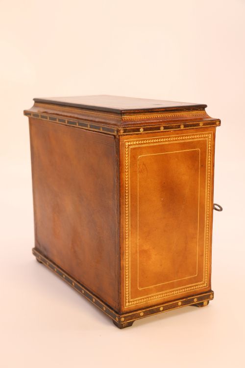 fig 3. An Italian Grand Tour late 19th century jewellery cabinet finished in gilt tooled leather with a hand coloured view of The Royal Palace, Caserta Italy.