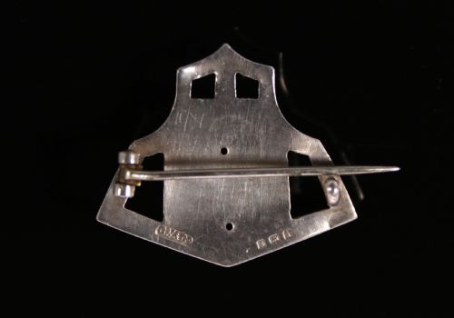 fig 1. An antique Arts and Crafts hammered silver and enamelled brooch

