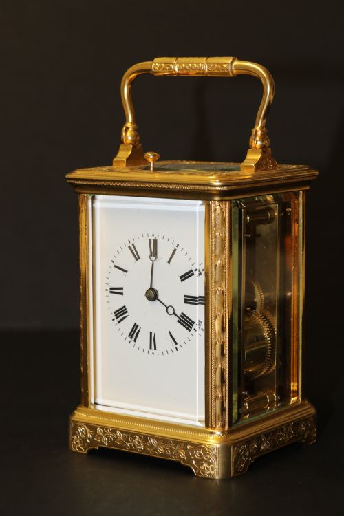 fig 1. A 19th century French hand engraved and gilt cased repeating carriage Clock by Francois Arsene Margaine