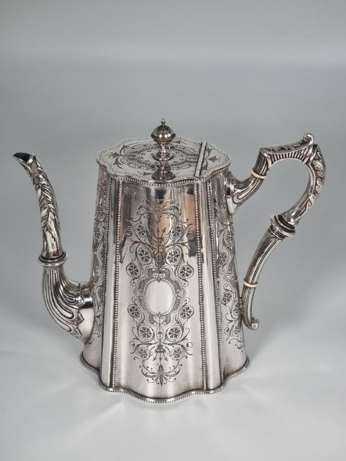 AN ENGLISH VICTORIAN SILVER PLATED TEACOFFEE SET LARGE AND ORNATE DECORATIVE FOUR PIECE SET - ADDITIONAL PHOTO 2