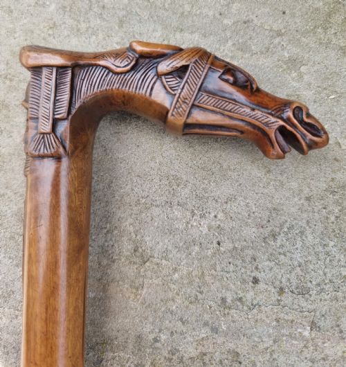 fig 2. A 19th C antique Grand Tour walking stick with an equestrian racehorse carved handle.