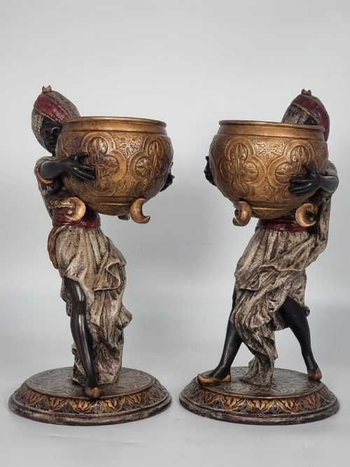 fig 1. A cast and cold painted pair of Blackamoor figure jardinieres