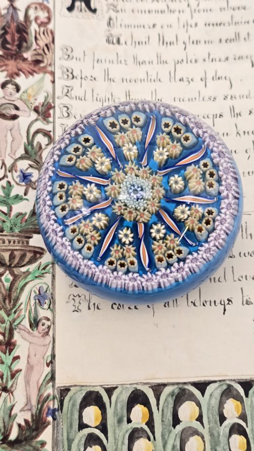 A FINE MILLEFIORI GLASS PAPERWEIGHT