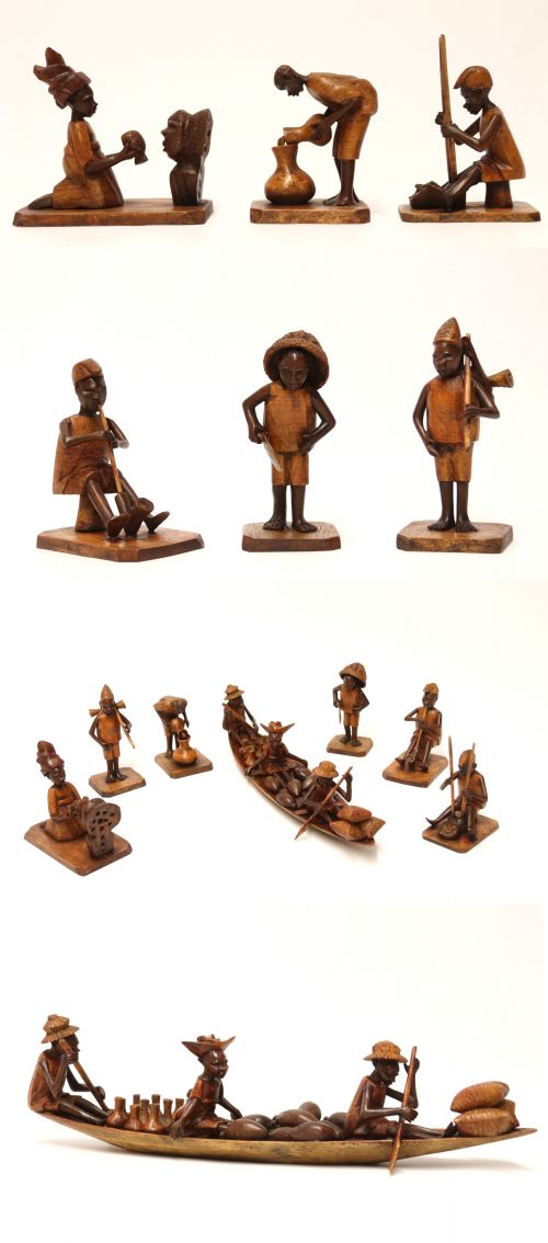 A Group of 7 Nigerian Hardwood Carved Figures Circa 1920