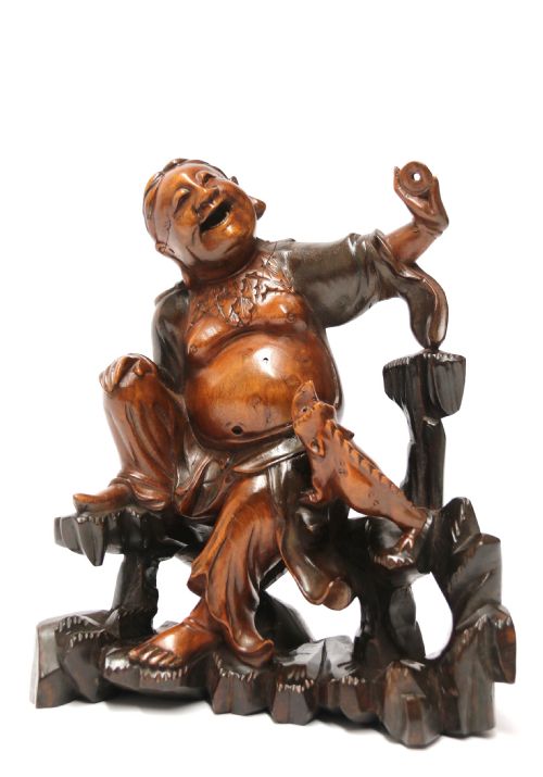 A LATE 19TH CENTURY CHINESE CARVED HARDWOOD FIGURE WITH MYTHICAL CREATURE - ADDITIONAL PHOTO 1