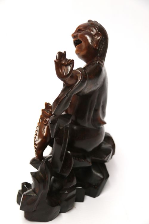 A LATE 19TH CENTURY CHINESE CARVED HARDWOOD FIGURE WITH MYTHICAL CREATURE - ADDITIONAL PHOTO 7