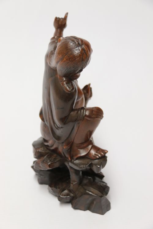 A LATE 19TH CENTURY CHINESE CARVED HARDWOOD FIGURE WITH MYTHICAL CREATURE - ADDITIONAL PHOTO 8
