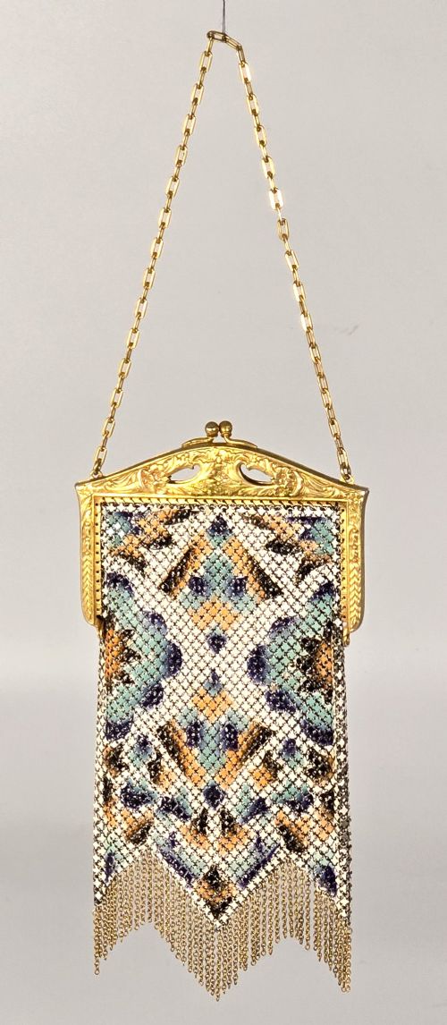 fig 1. A rare Art Deco evening purse, painted and gilt metal mounted circa 1920.