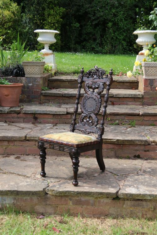 19TH CENTURY ORNATELY CARVED WALNUT HIGH BACKED CHAIR - ADDITIONAL PHOTO 4
