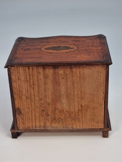 A MINIATURE 18TH C ENGLISH SERPENTINE CHEST OF DRAWERS VENEERED IN SATINWOOD WITH MARQUETRY SIGNED AND DATED 1907 - ADDITIONAL PHOTO 5