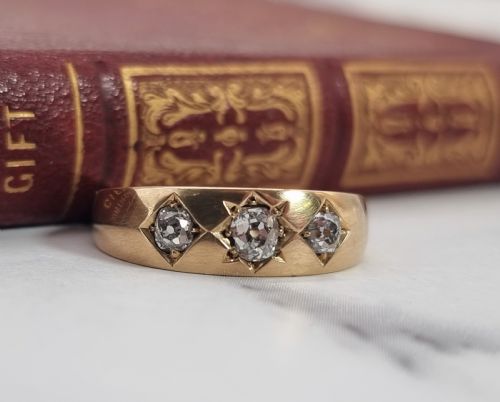 fig 1. A gold and diamond three stone ring, Victorian 1870