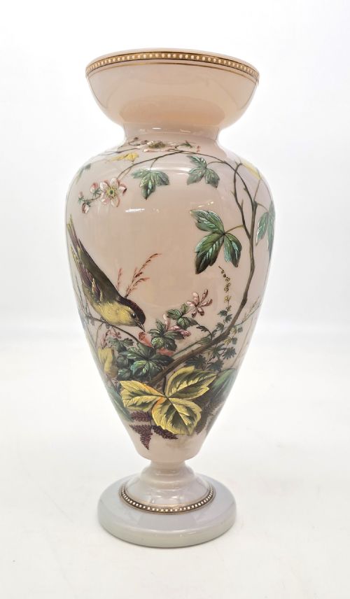 fig 2. A Victorian opalescent blush pink glass urn vase decorated with hand-painted enamel illustrations of a songbird, delicate blossoms, and gilt trim along the flared rim and base.