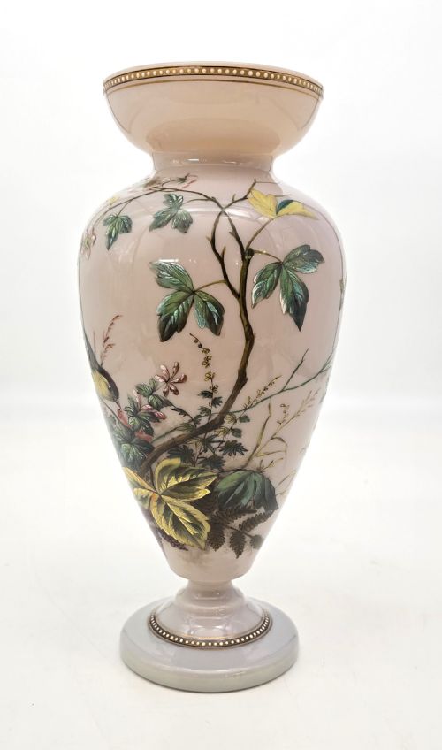 fig 3. A Victorian opalescent blush pink glass urn vase decorated with hand-painted enamel illustrations of a songbird, delicate blossoms, and gilt trim along the flared rim and base.