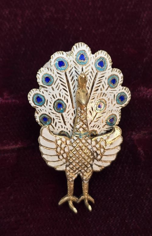fig 2. A pair of silver and enamel Asian peacock earrings