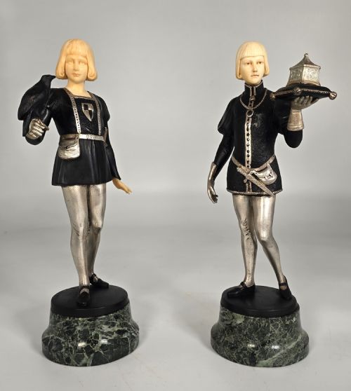 A Pair of Bronze and Ivory Figures by  Gotthilf Jaeger, the Falconer and the Casket Bearer
