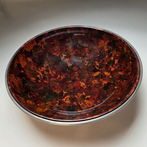 fig 1. A pierced pewter bowl with a marbled Bakelite liner from the Art Deco period