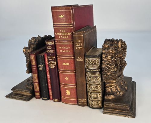 fig 1. A pair of antique Regency period bookends featuring detailed sculpted wheat sheaves with a gilded finish mounted on stepped bases.