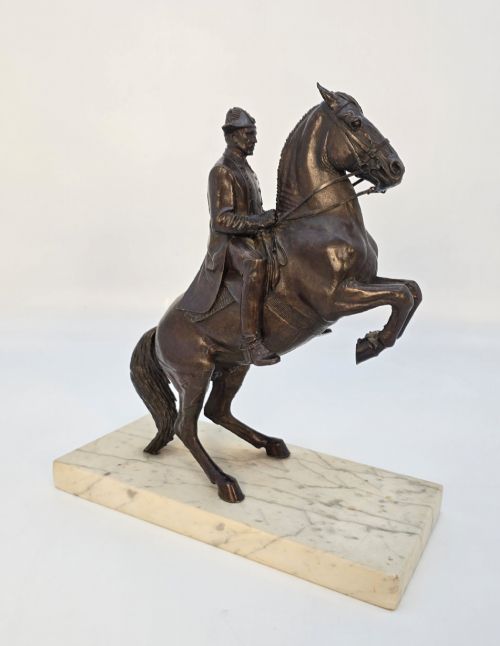 A rare equestrian bronze study showing a rider and horse from the Spanish School Vienna