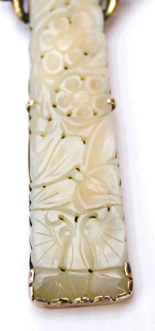 A late 19th-century Chinese silver magnifying glass featuring a carved white jade handle and an openwork grapevine frame with animal details. View VIII