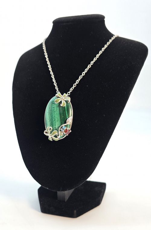 A PENDANT NECKLACE MADE FROM MALACHITE SILVER AND ENAMEL CIRCA 1950