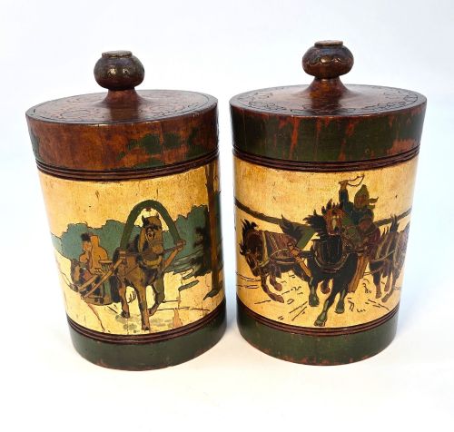 A PAIR OF TREEN RUSSIAN TOBACCO CONTAINERS WITH CARVED AND PAINTED DECORATION CIRCA 1890