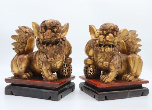 A Highly Decorative Pair of Carved Gilt Wood and Lacquer Chinese Buddhist Lions