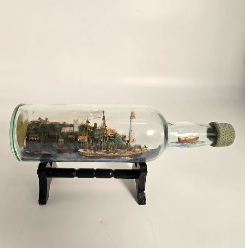 A Folk Art Ship in a Bottle Diorama Dated 1922