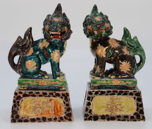A Highly Decorative Pair of Chinese Pottery Buddhist Lions Circa 1900.