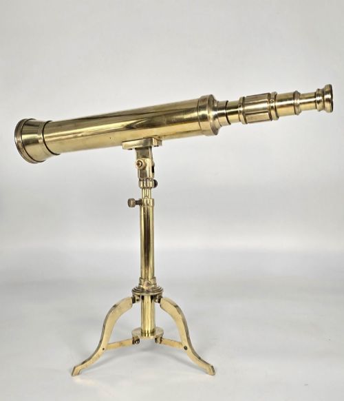 fig 1. A Victorian brass tabletop telescope mounted on an adjustable folding brass tripod stand.