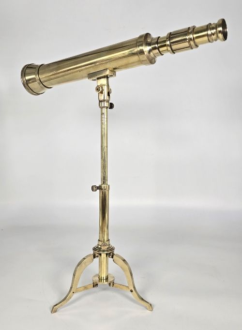 fig 2. A Victorian brass tabletop telescope mounted on an adjustable folding brass tripod stand.