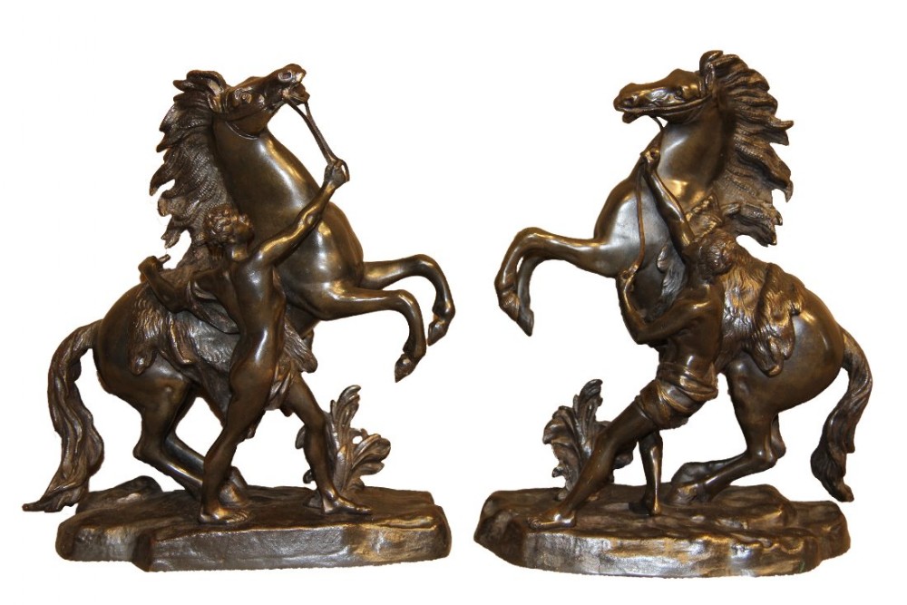 A pair of bronze Marley Horses