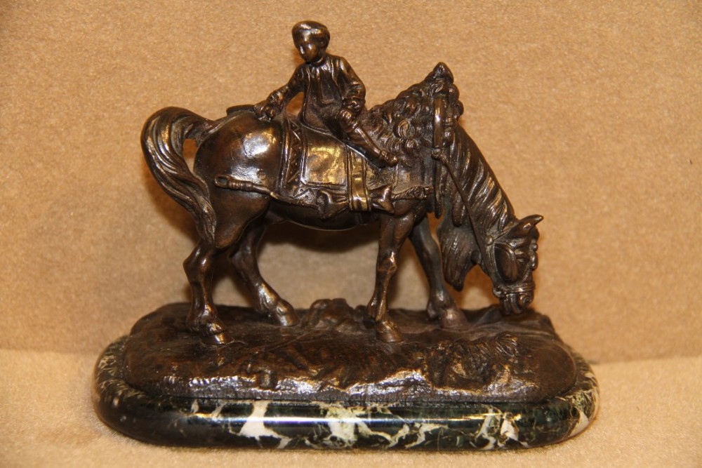 A miniature bronze figure of carriage horse