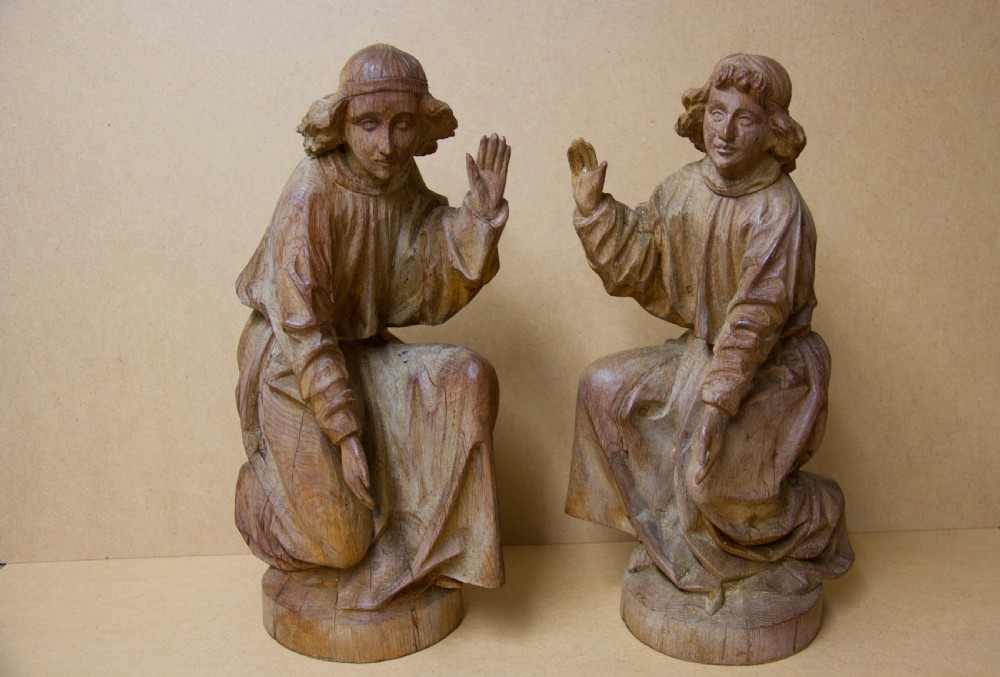 A rare pair of early carved oak religious figures of saints View XIX