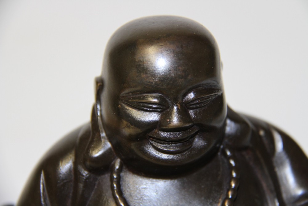 A Chinese bronze Buddha View X