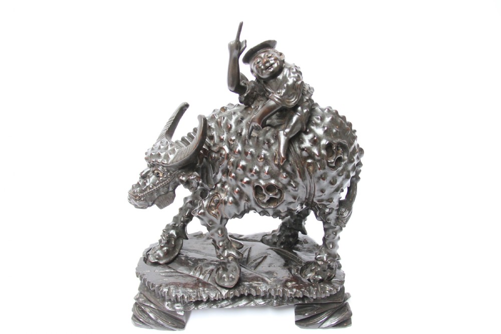 A pair of Chinese hardwood buffalo View III